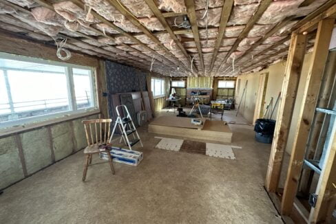 a room that has a lot of wood in it.