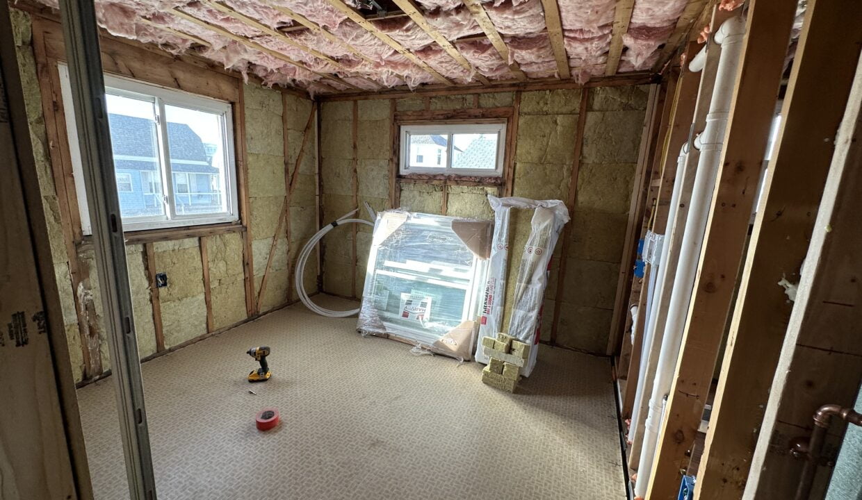 a room that is under construction with a window.