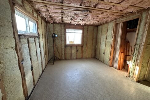 a room that is under construction with a lot of insulation.