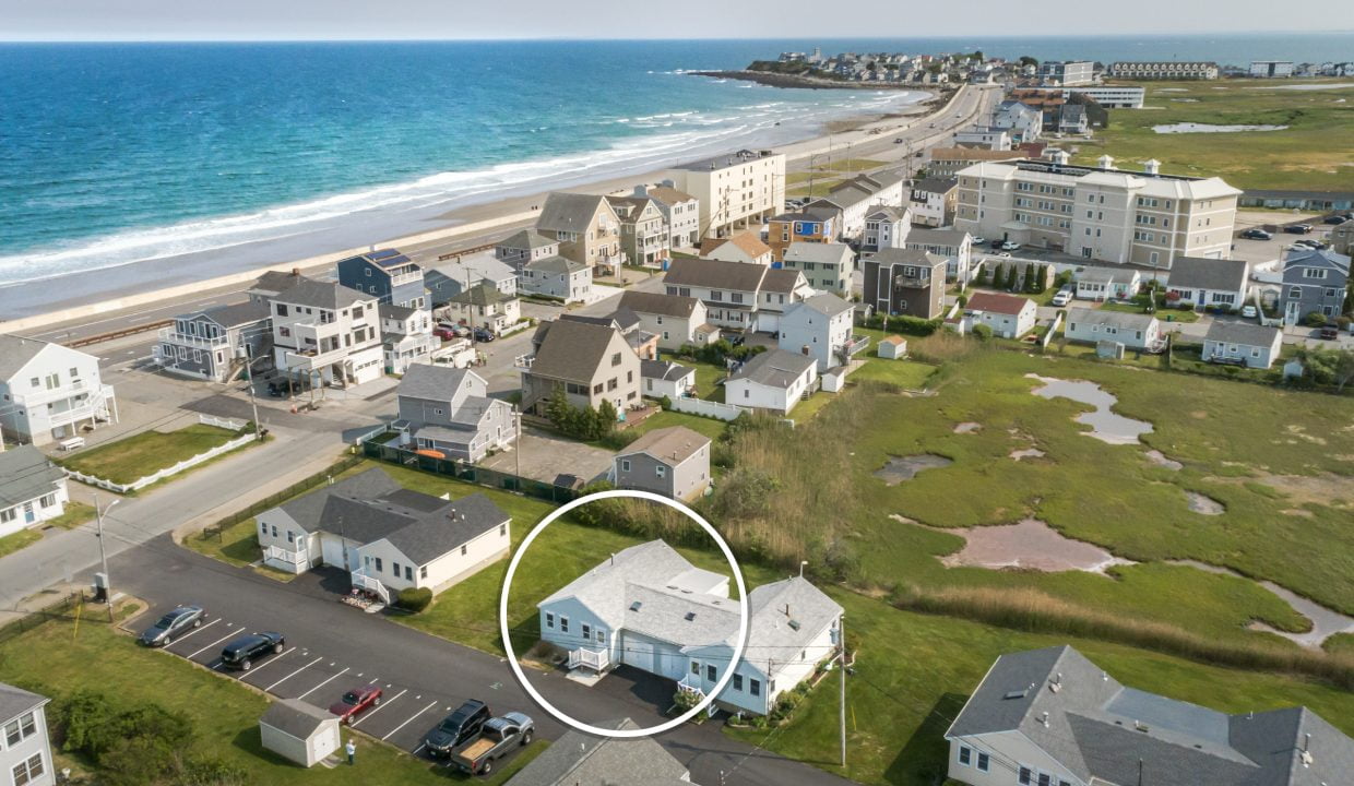 an aerial view of a beach front neighborhood.
