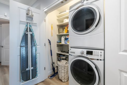 A laundry room with a washer and dryer.