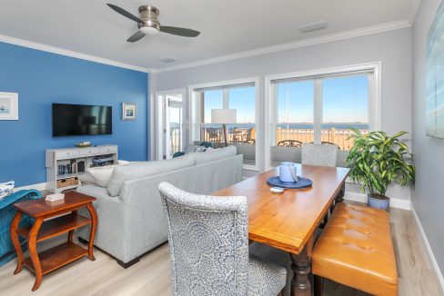 A living room with a blue wall.