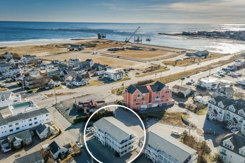 An aerial view of a house near the ocean.