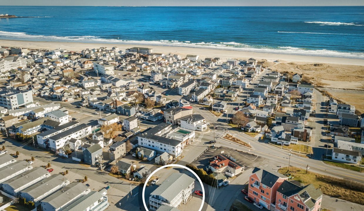 An aerial view of a house near the ocean.