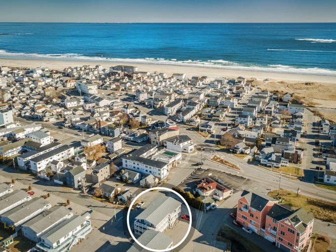 An aerial view of a house near the ocean.