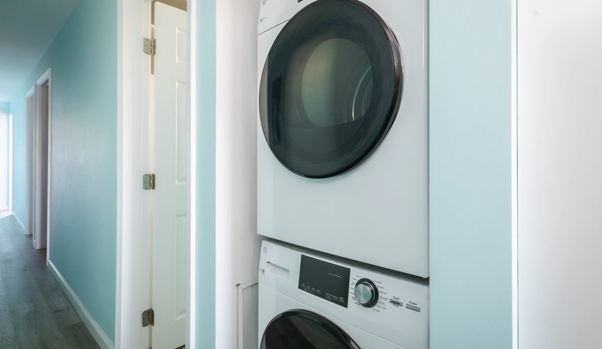 A laundry room with a washer and dryer.