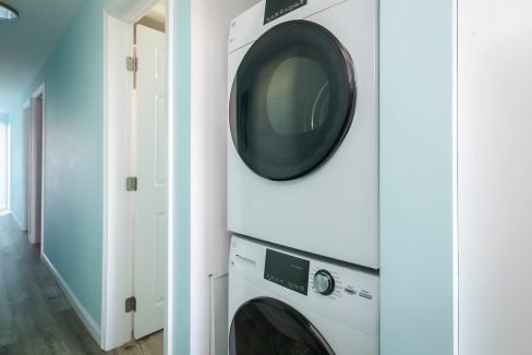 A laundry room with a washer and dryer.