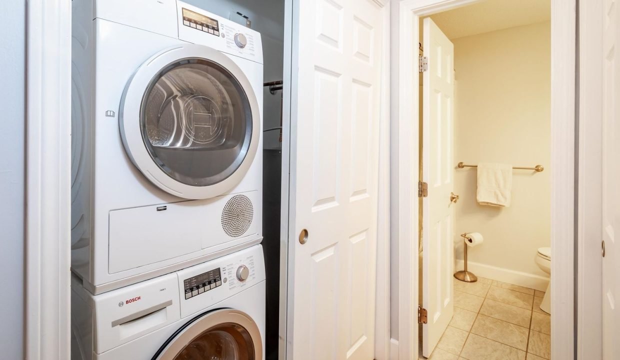 A laundry room with a washer and dryer.