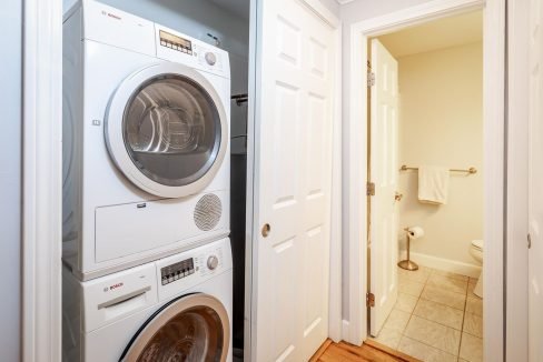 A laundry room with a washer and dryer.