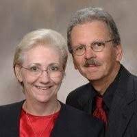 A man and woman posing for a photo.